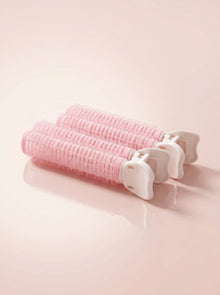 Dúo de pinzas ruleros rosas para dar volumen al cabello, accesorio de peinado cute para levantar raíces y crear volumen natural.